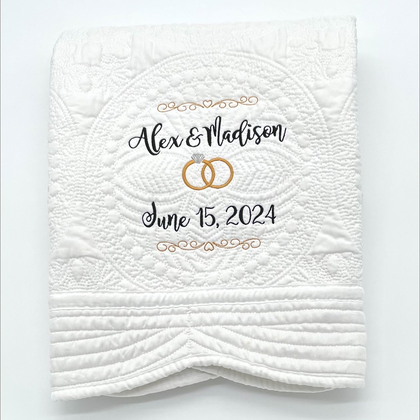 Personalized Wedding Heirloom Quilt Blankets - Custom embroidered with names, date and wedding rings. Border color options include pink, blue, white, green & purple. The perfect wedding, engagement or shower gift!