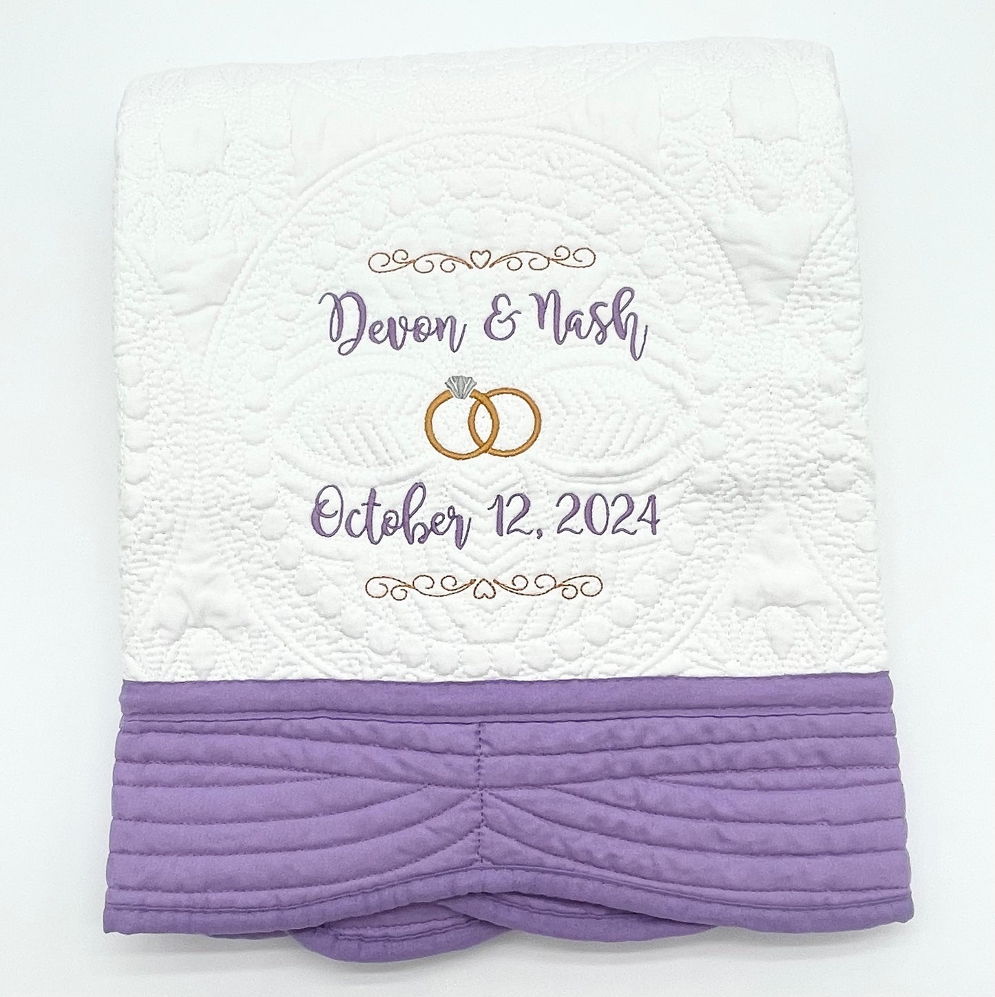 Personalized Wedding Heirloom Quilt Blankets - Custom embroidered with names, date and wedding rings. Border color options include pink, blue, white, green & purple. The perfect wedding, engagement or shower gift!