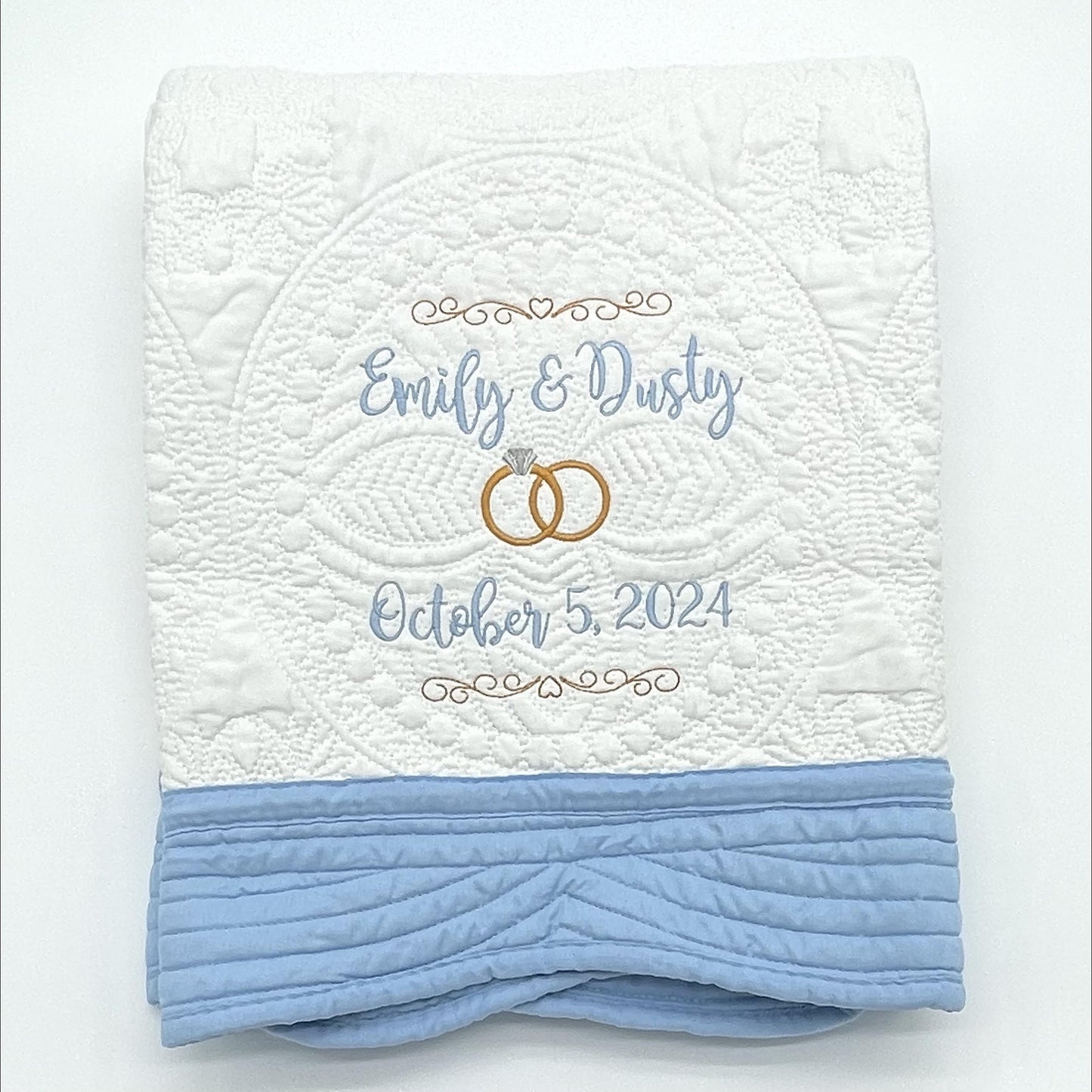 Personalized Wedding Heirloom Quilt Blankets - Custom embroidered with names, date and wedding rings. Border color options include pink, blue, white, green & purple. The perfect wedding, engagement or shower gift!